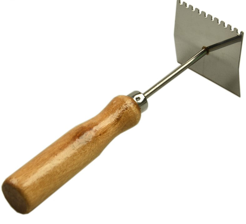 Grattoir pour grille à reine